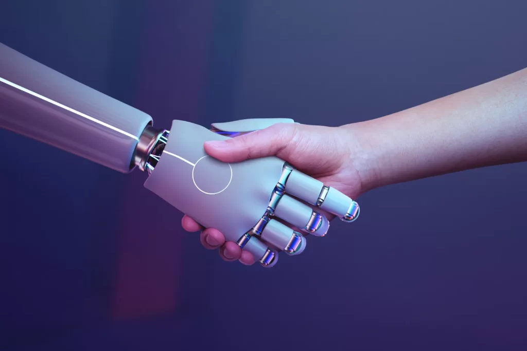 A handshake between a robotic AI hand and a human hand on a purple gradient background.